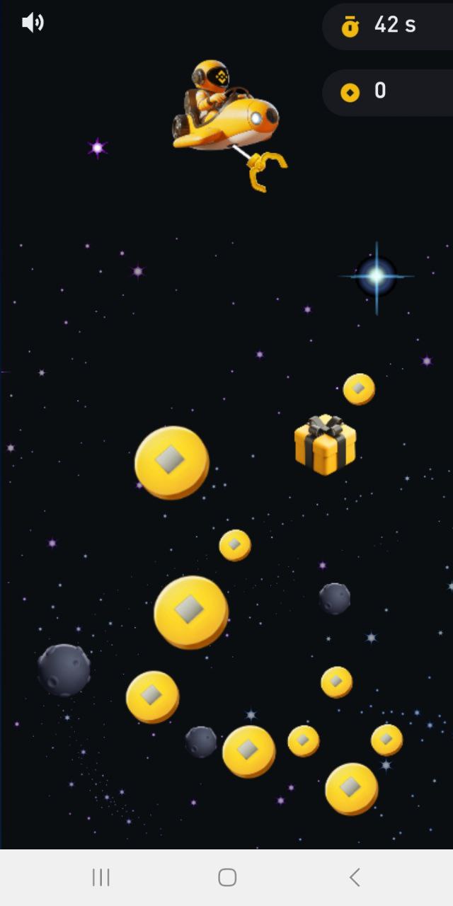 Moonbix game interface showing space-themed gameplay with golden balls and meteors in Binance's Telegram play-to-earn mini-game